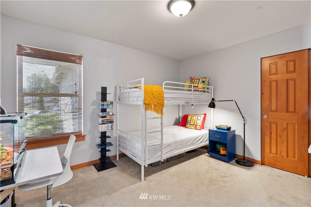 20815 9th Drive Southeast Bothell, WA 98021 - Photo 17 of 23 a bedroom with furniture and a window