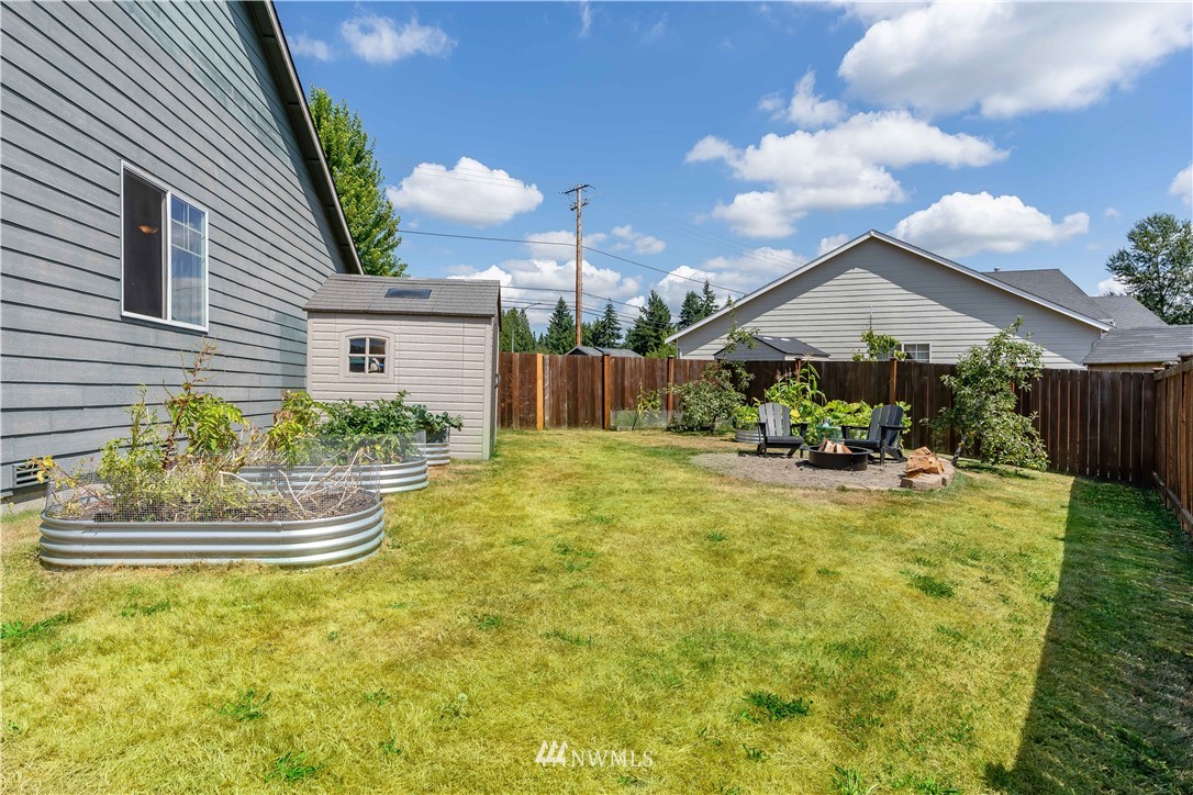 20815 9th Drive Southeast Bothell, WA 98021 - Photo 22 of 23 a view of a house with swimming pool and sitting area