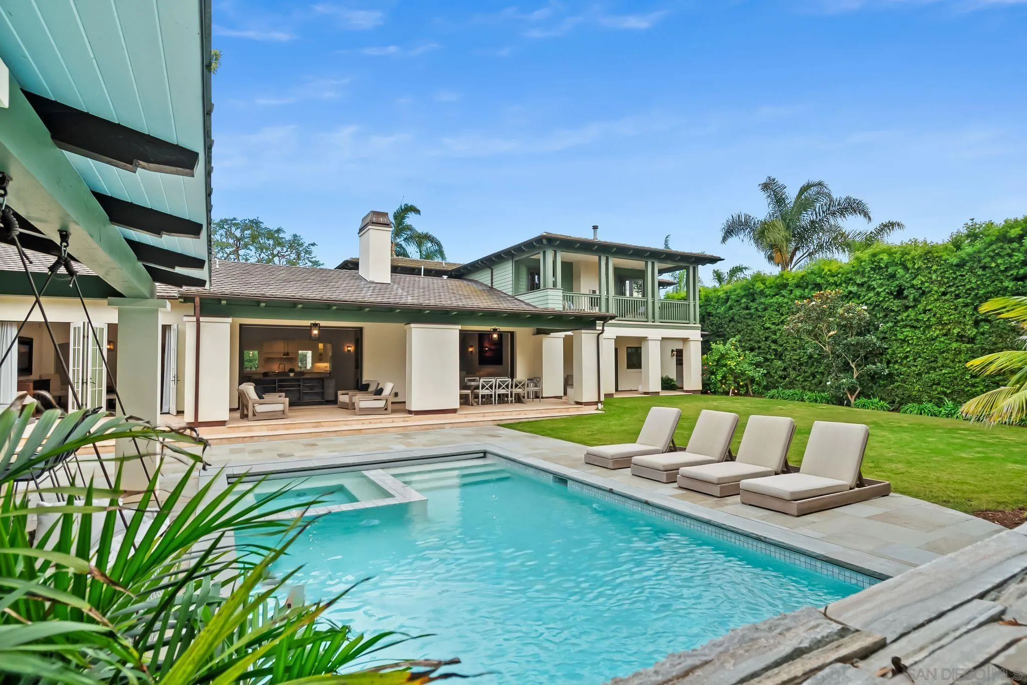 5930 Rutgers Road La Jolla, CA 92037 - Photo 21 of 43 a view of a house with swimming pool and sitting area