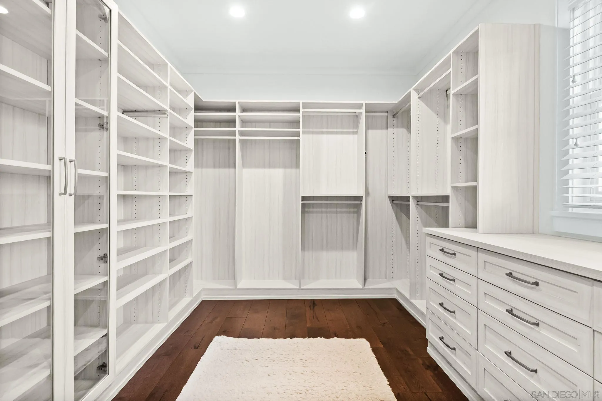 5930 Rutgers Road La Jolla, CA 92037 - Photo 31 of 43 a view of walk in closet with empty racks