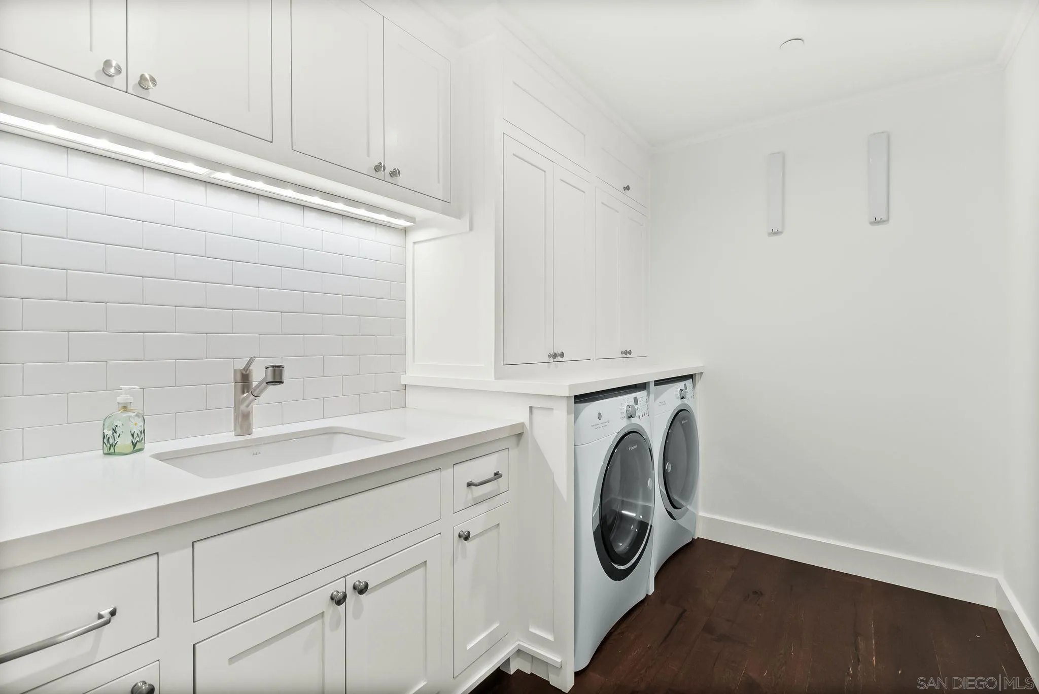 5930 Rutgers Road La Jolla, CA 92037 - Photo 41 of 43 a utility room with dryer and washer