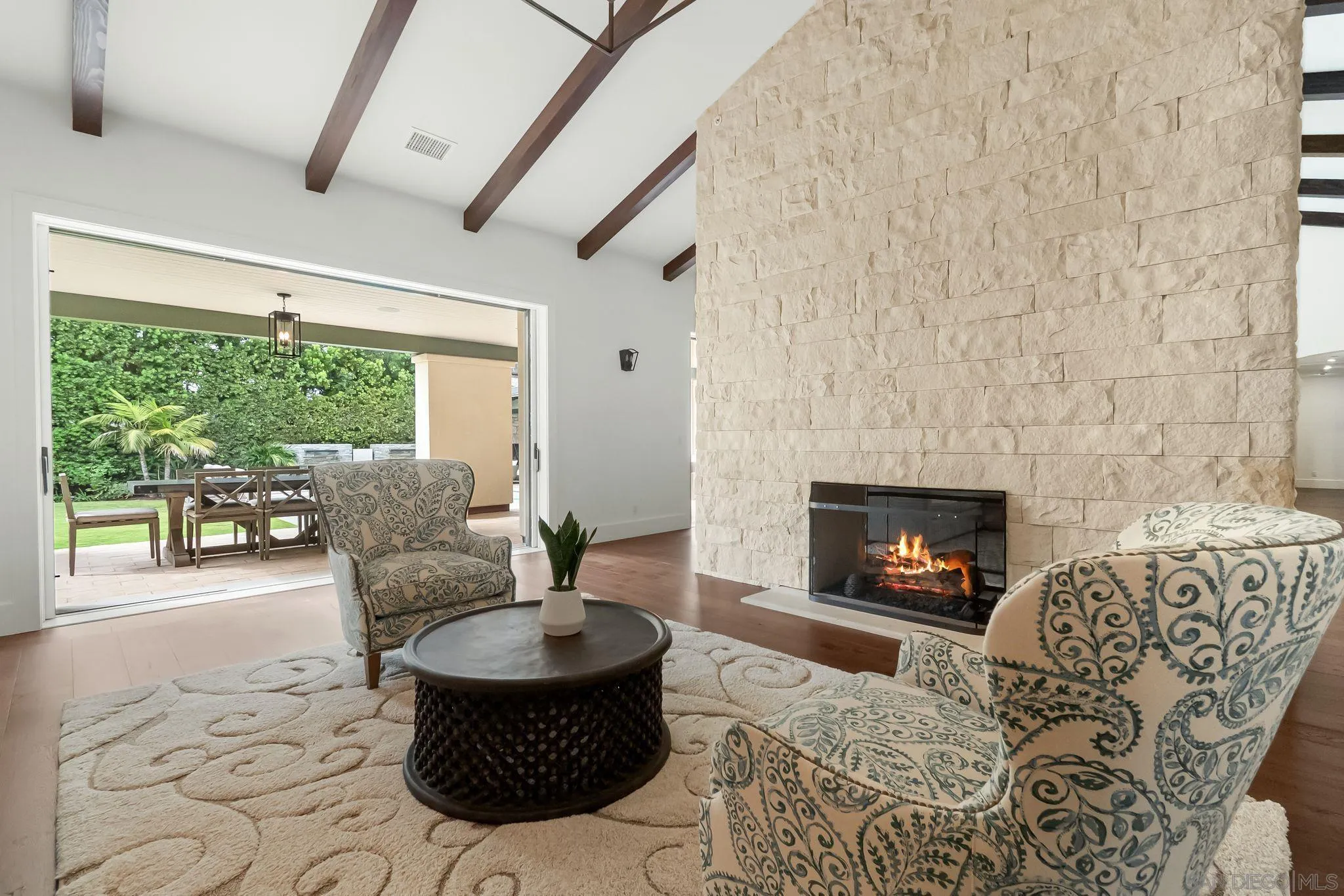 5930 Rutgers Road La Jolla, CA 92037 - Photo 9 of 43 a living room with furniture and a fireplace