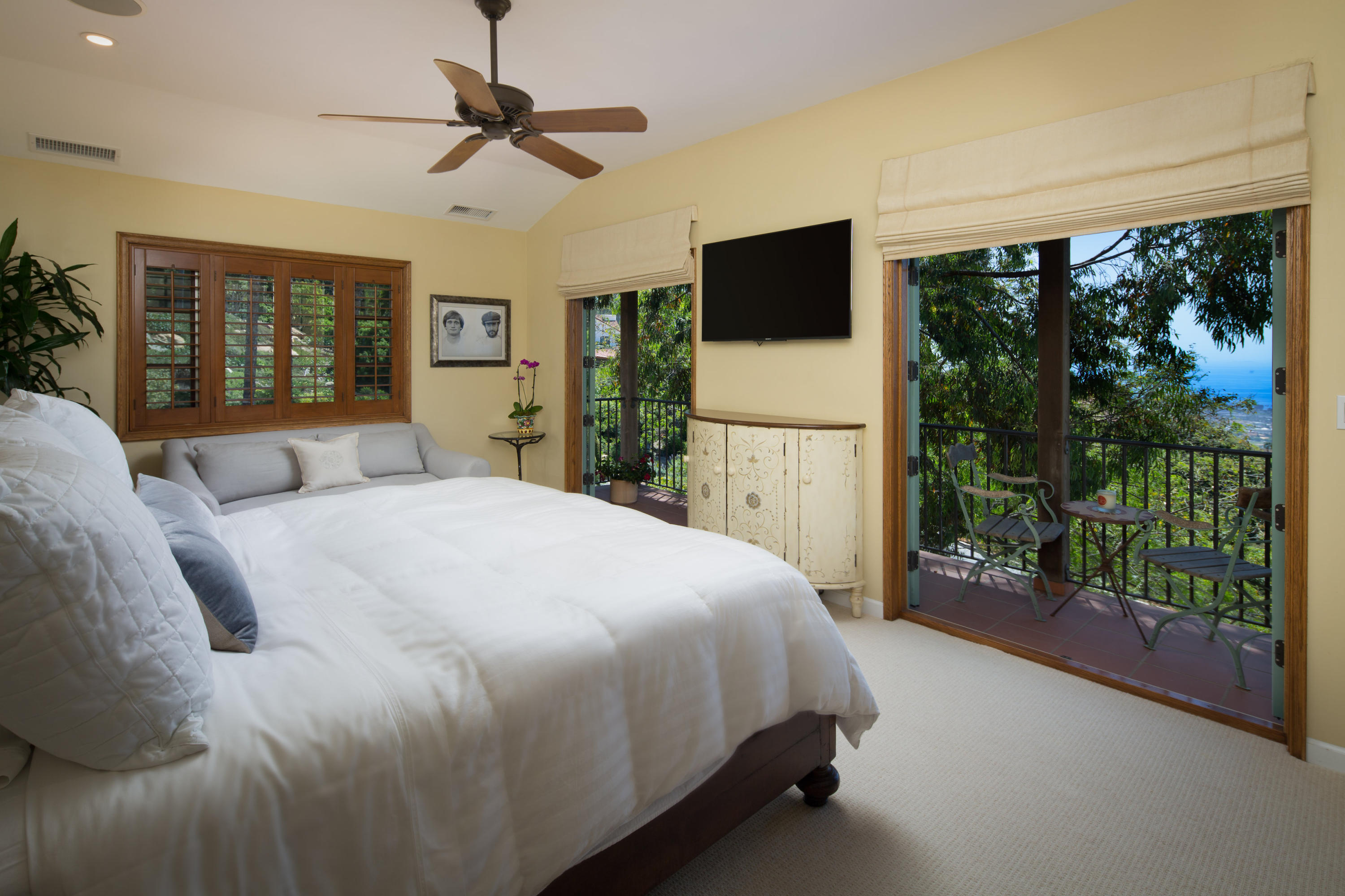 1810 Mission Ridge Road Santa Barbara, CA 93103 - Photo 12 of 30 a spacious bedroom with a large bed and a tv