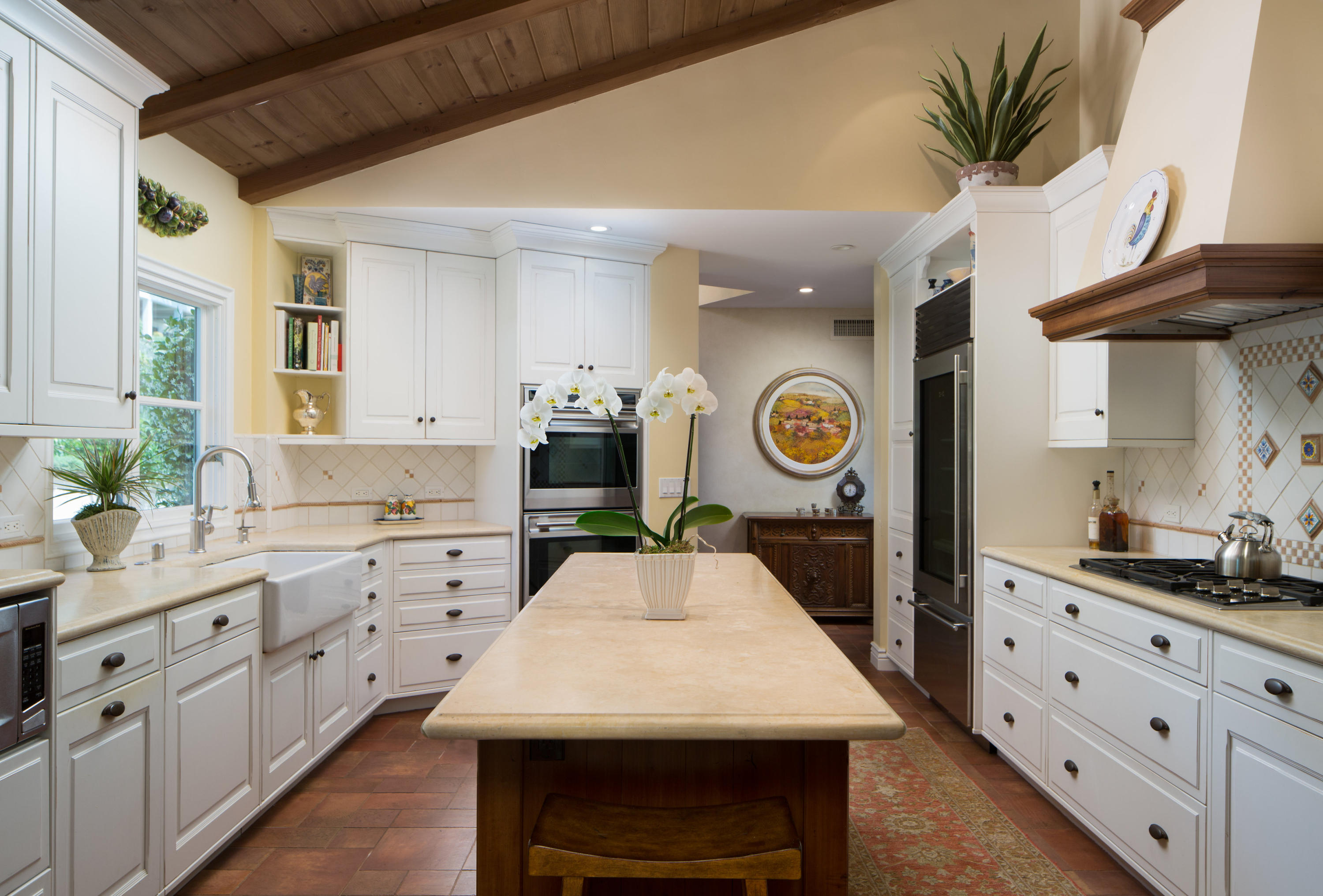 1810 Mission Ridge Road Santa Barbara, CA 93103 - Photo 8 of 30 a kitchen that has a lot of cabinets in it and wooden floor