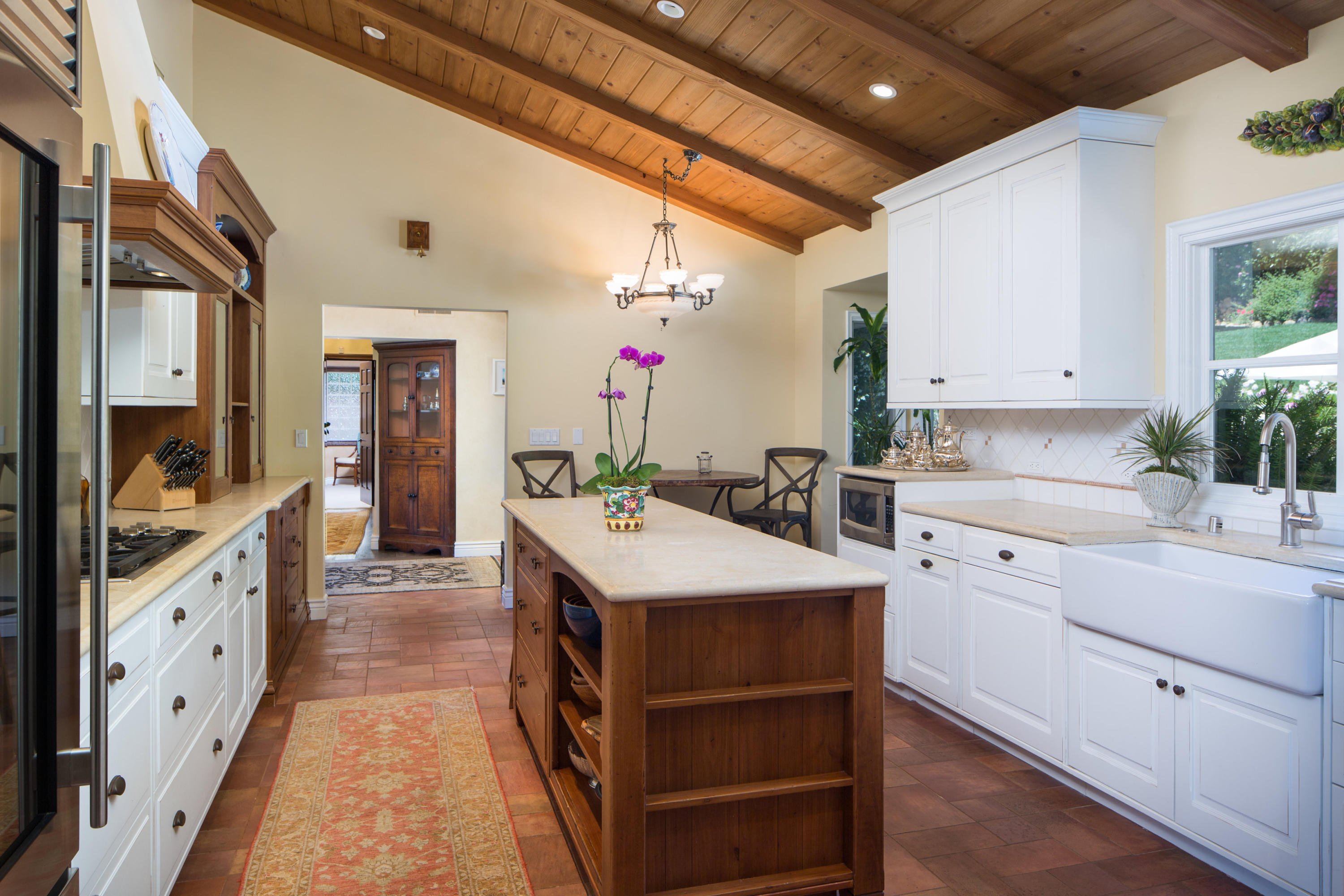 1810 Mission Ridge Road Santa Barbara, CA 93103 - Photo 9 of 30 a kitchen with a sink stove and cabinets