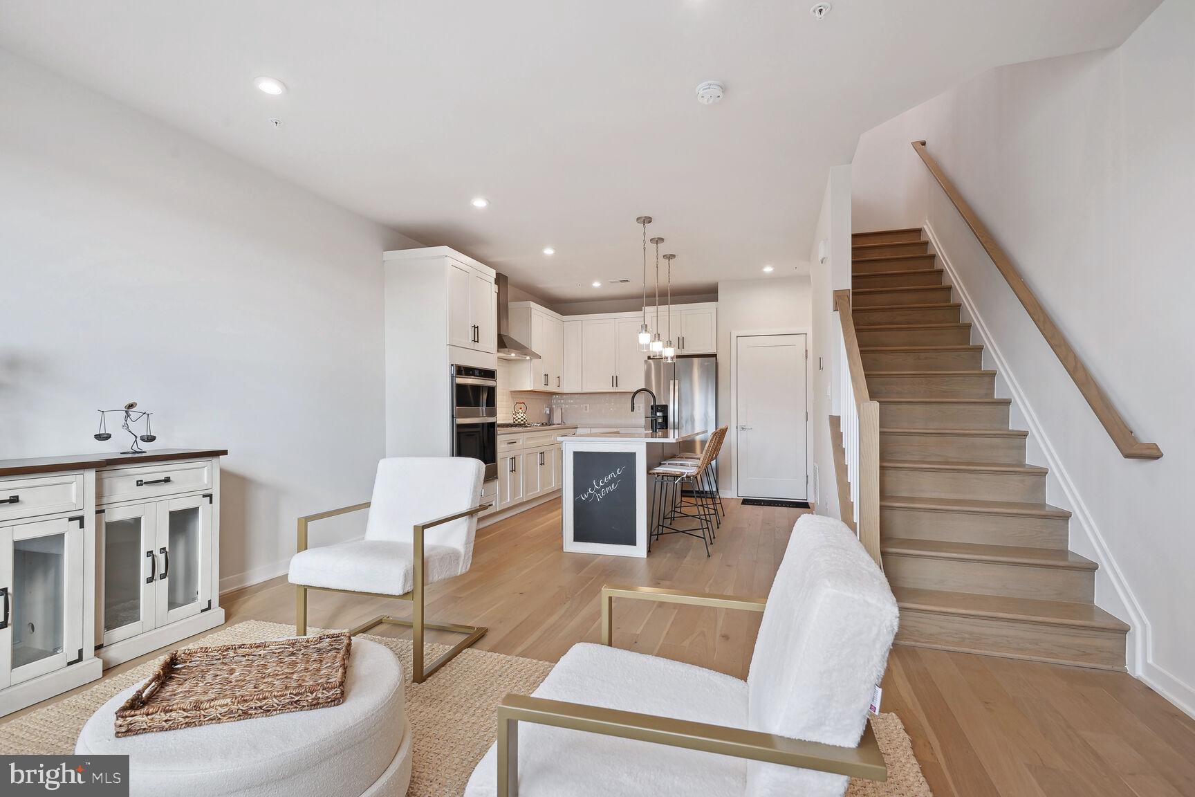 43538 Centergate Drive Ashburn, VA 20148 - Photo 5 of 17 Family/Great Room to kitchen