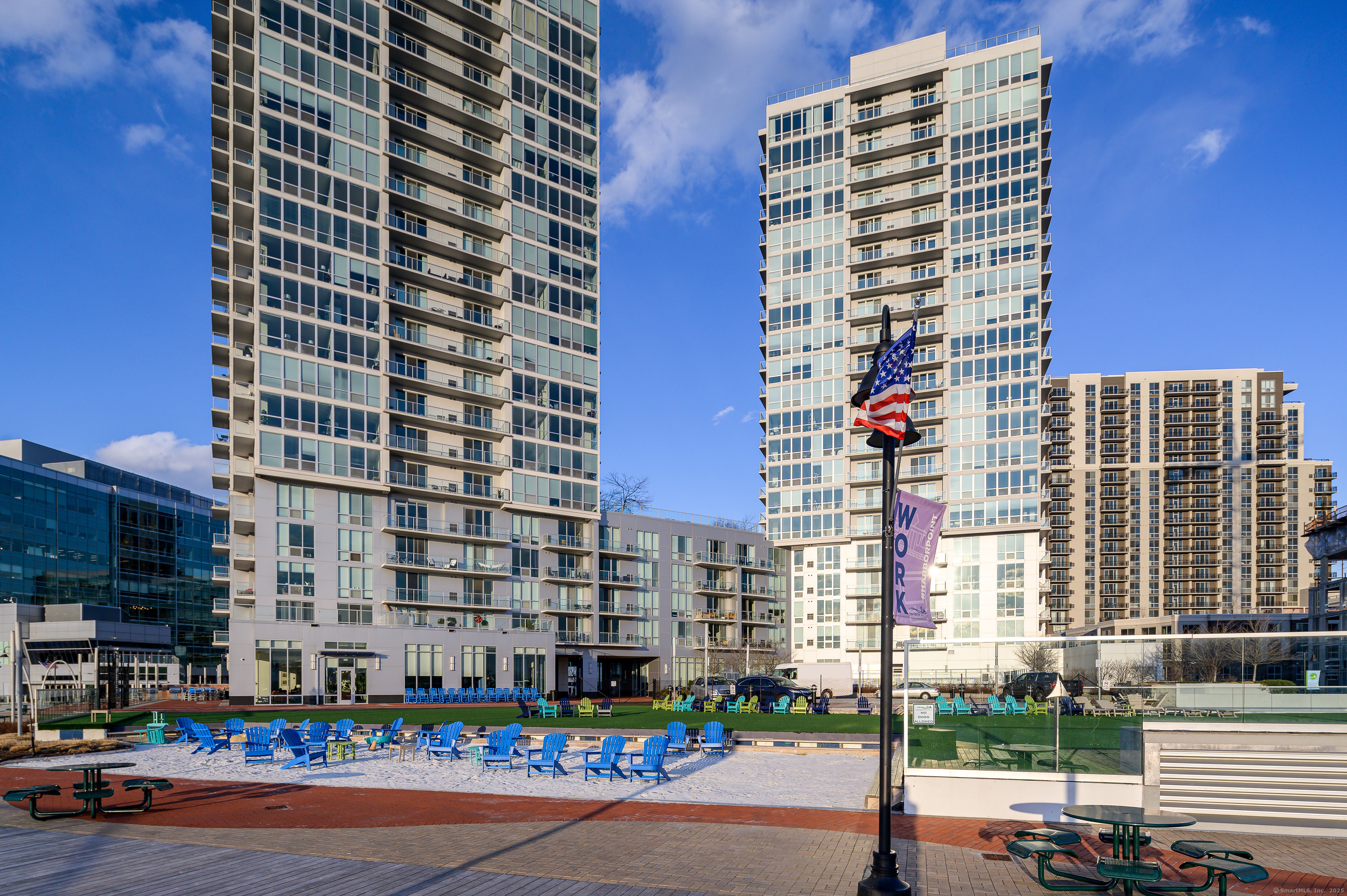 1 Harbor Point Road, Unit 1 Stamford, CT 06902 - Photo 22 of 23 a city street filled with lots of tall buildings and a street