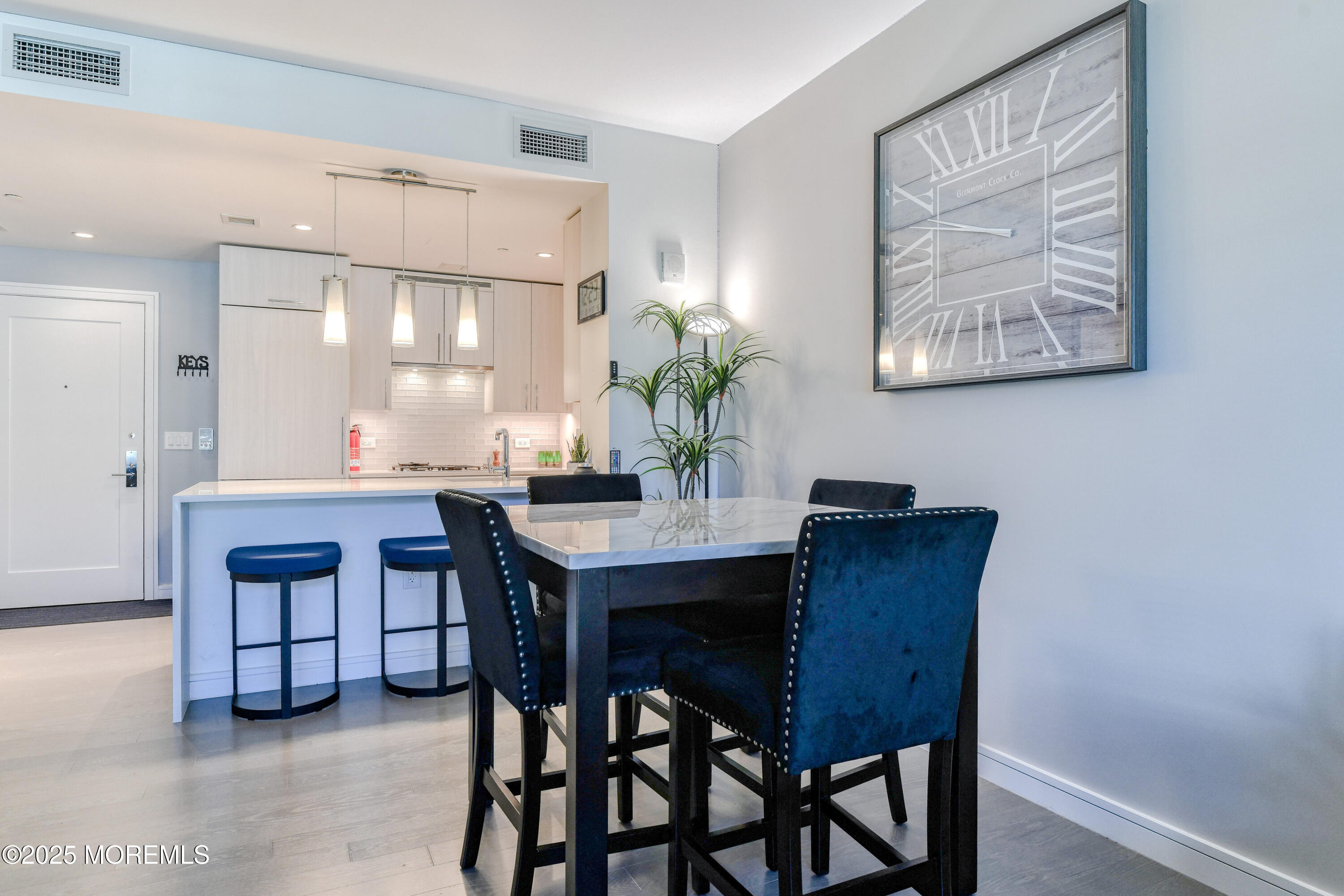 30 Melrose Terrace, Unit 303 Long Branch, NJ 07740 - Photo 13 of 54 a dining room with furniture and window