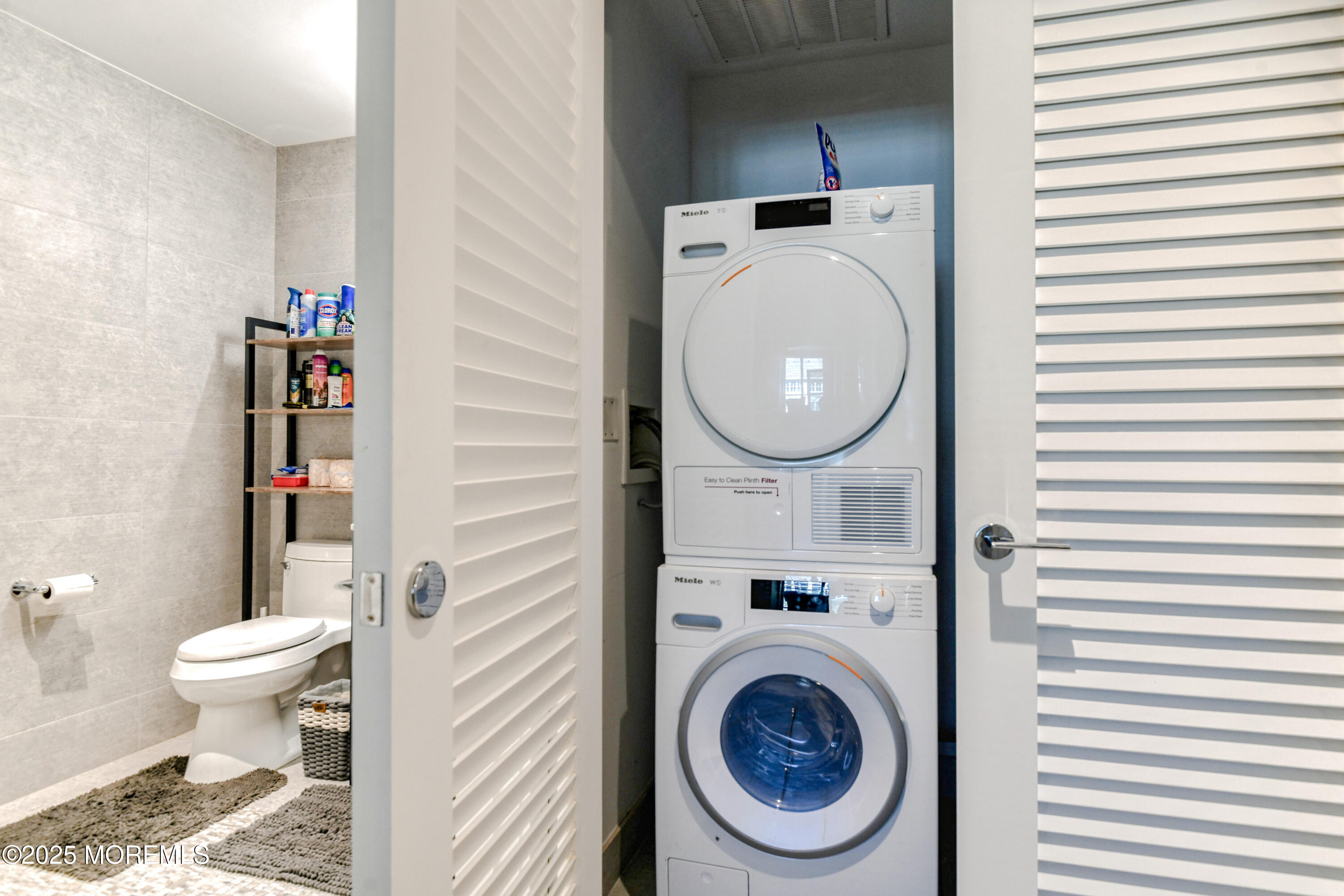 30 Melrose Terrace, Unit 303 Long Branch, NJ 07740 - Photo 24 of 54 a bathroom with a toilet and a sink