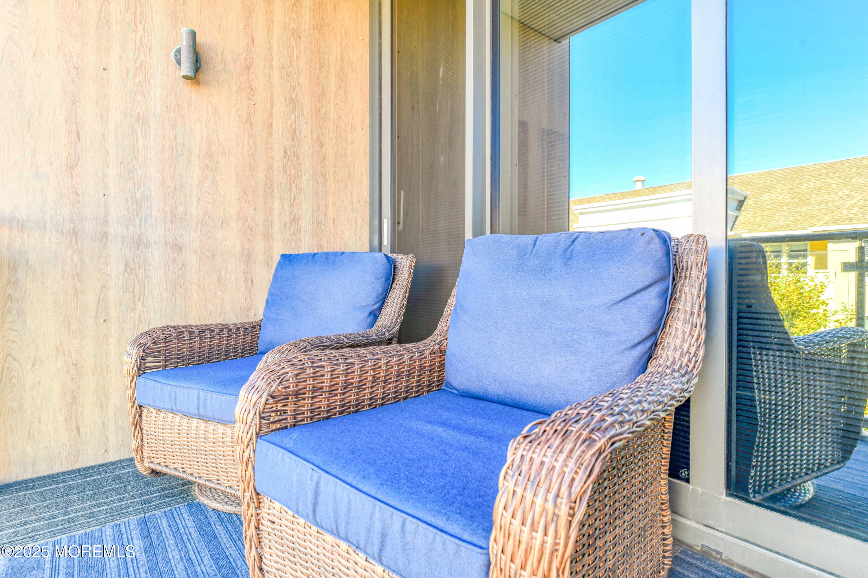 30 Melrose Terrace, Unit 303 Long Branch, NJ 07740 - Photo 26 of 54 a view of a bedroom with furniture and wooden floor