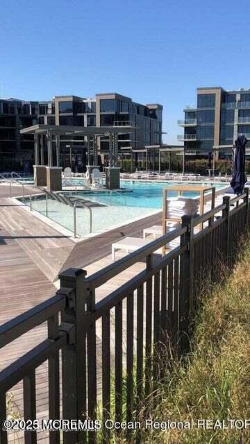 30 Melrose Terrace, Unit 303 Long Branch, NJ 07740 - Photo 29 of 54 a view of building with outdoor space