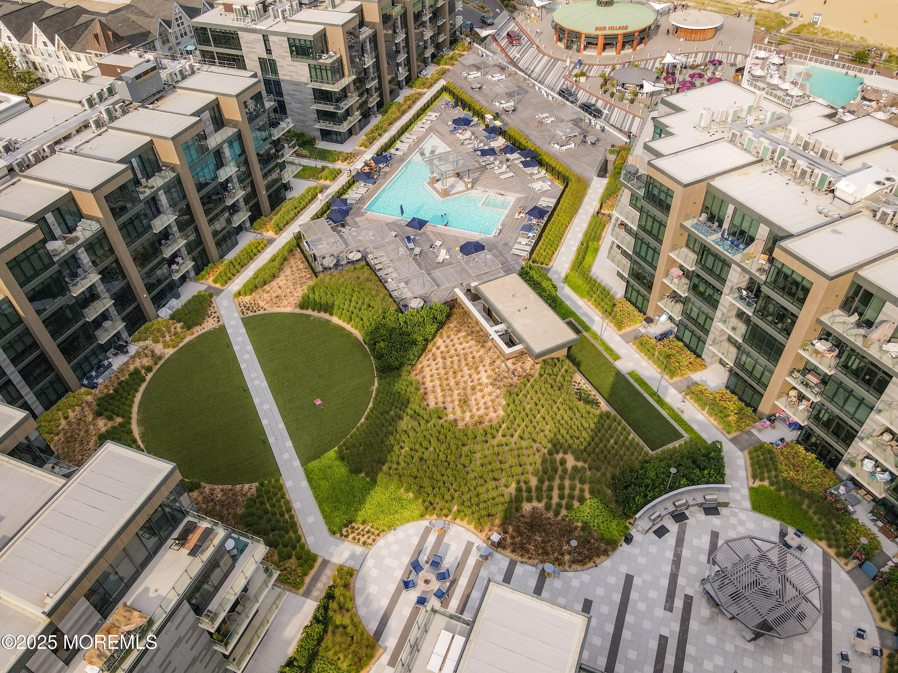30 Melrose Terrace, Unit 303 Long Branch, NJ 07740 - Photo 33 of 54 an aerial view of a houses with a yard