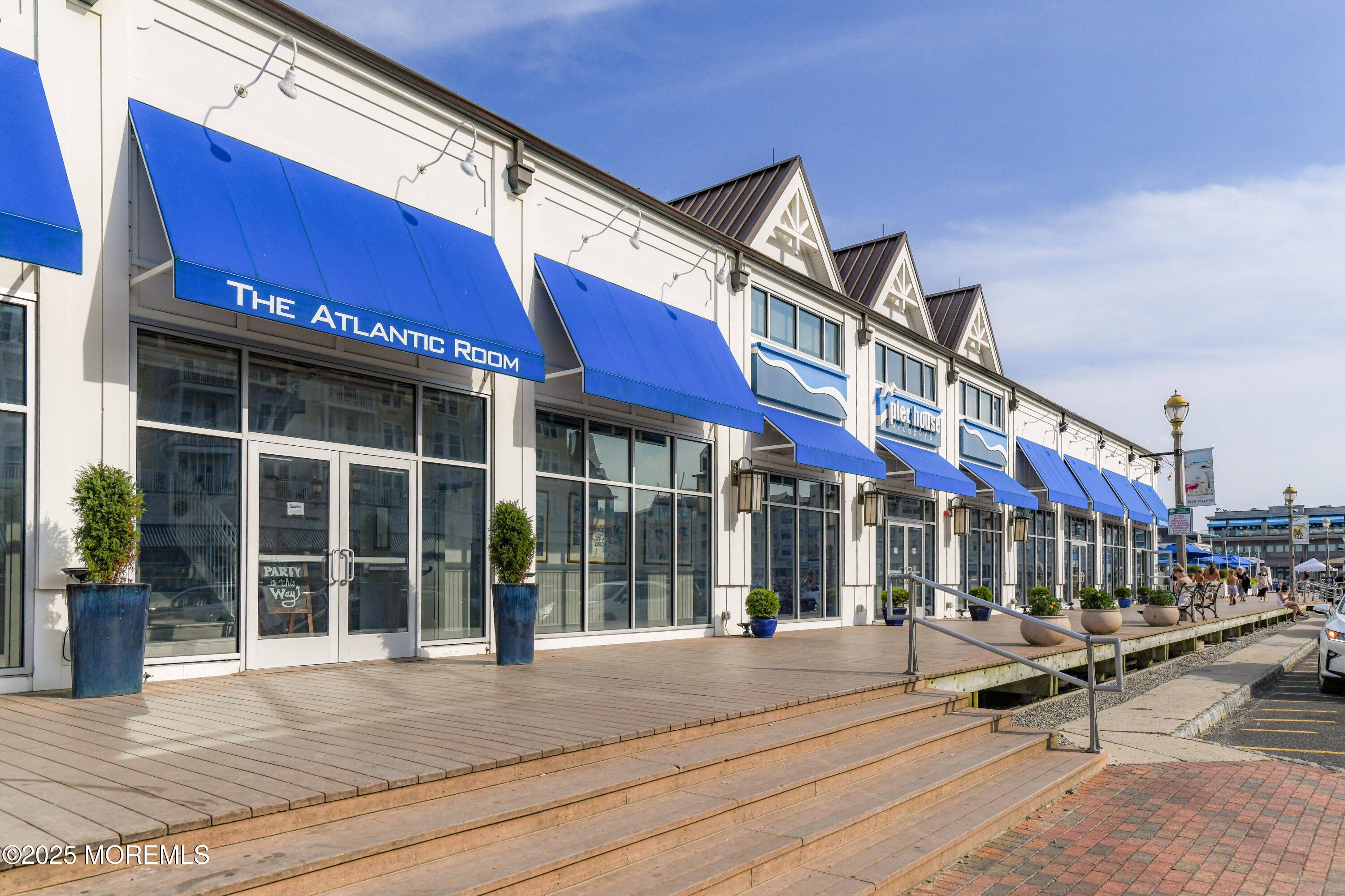 30 Melrose Terrace, Unit 303 Long Branch, NJ 07740 - Photo 42 of 54 a view of a building with sitting area