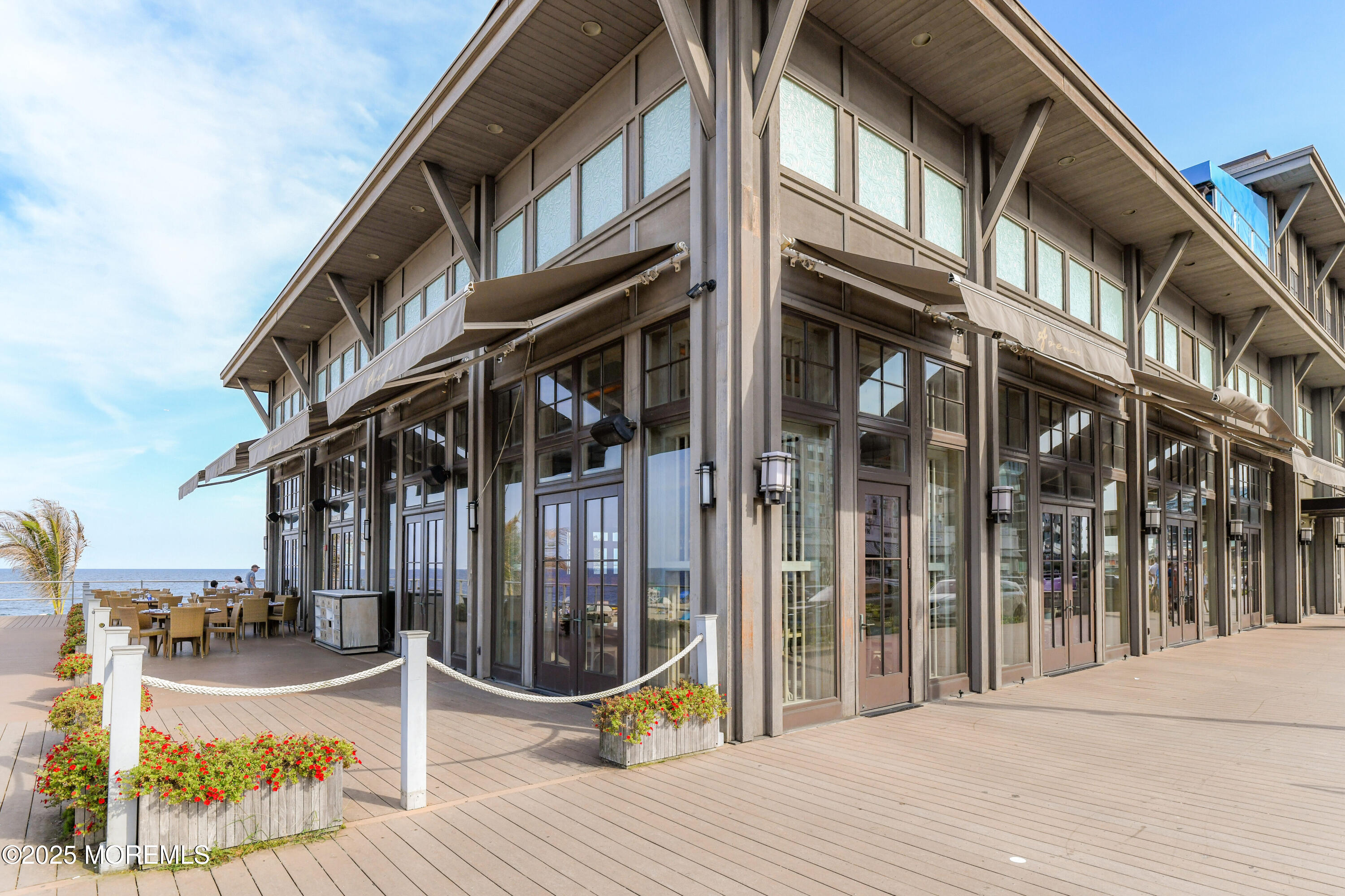 30 Melrose Terrace, Unit 303 Long Branch, NJ 07740 - Photo 43 of 54 a view of a building with a patio