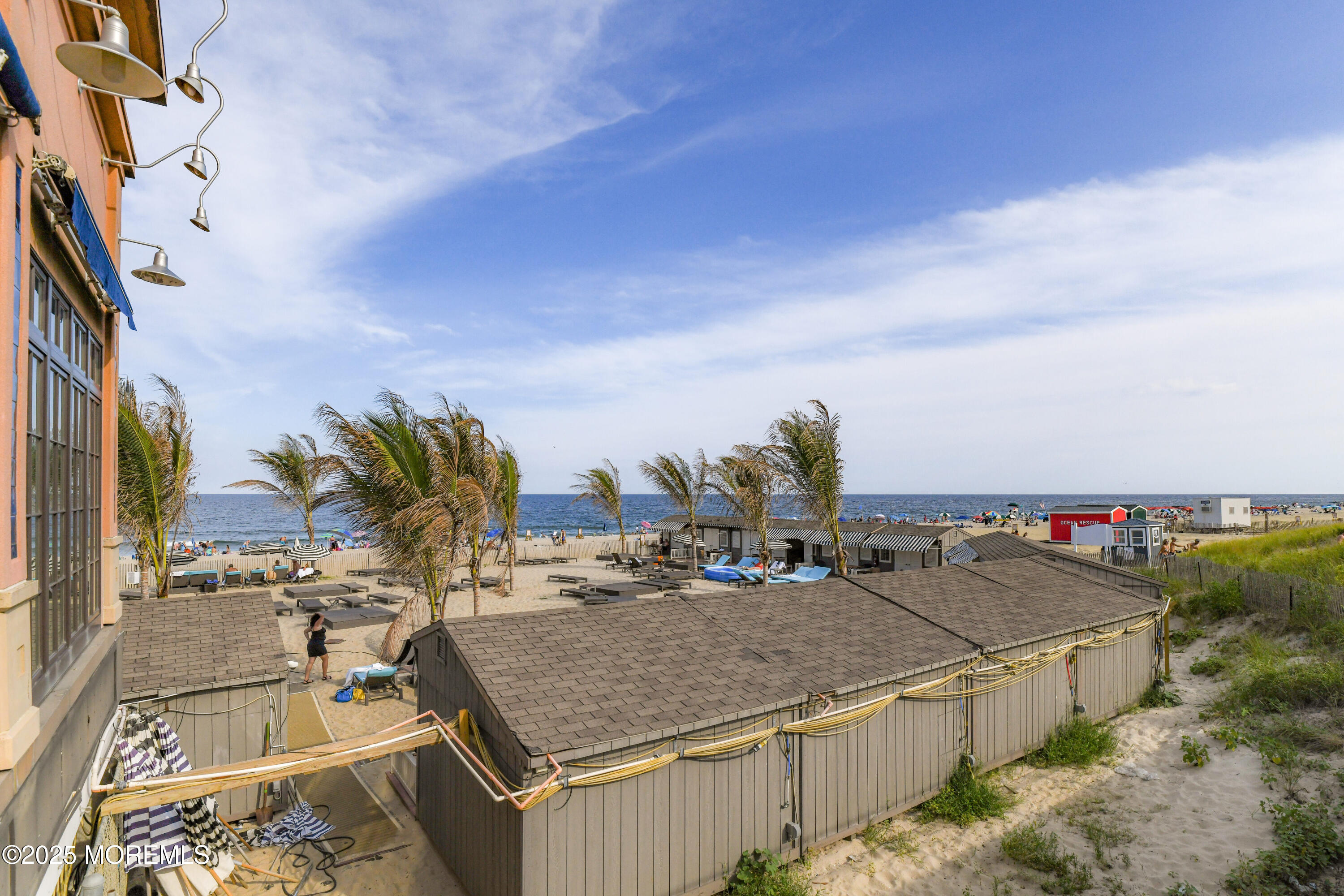 30 Melrose Terrace, Unit 303 Long Branch, NJ 07740 - Photo 46 of 54 a terrace with outdoor seating and city view