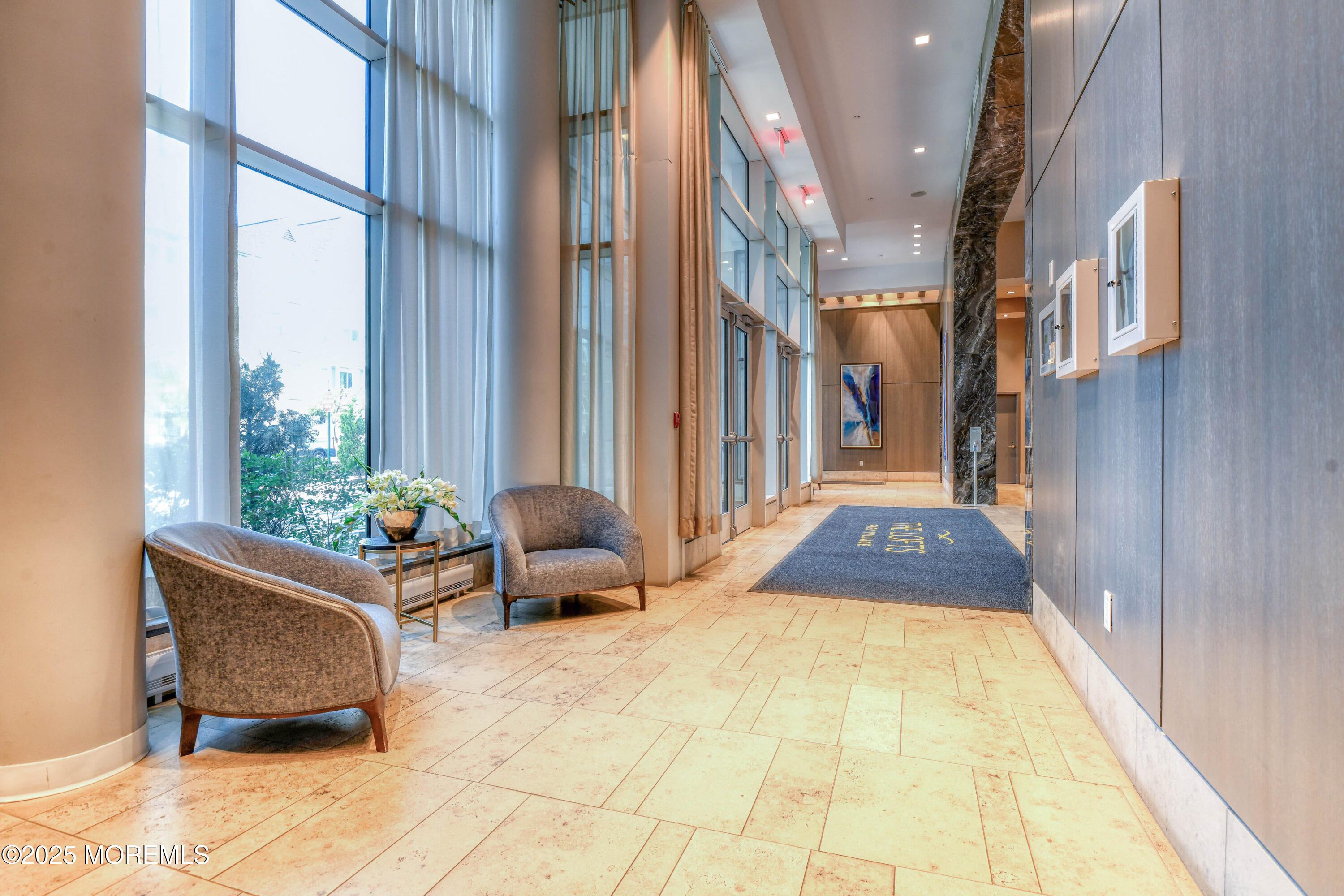 30 Melrose Terrace, Unit 303 Long Branch, NJ 07740 - Photo 5 of 54 a bed sitting in a room next to a window