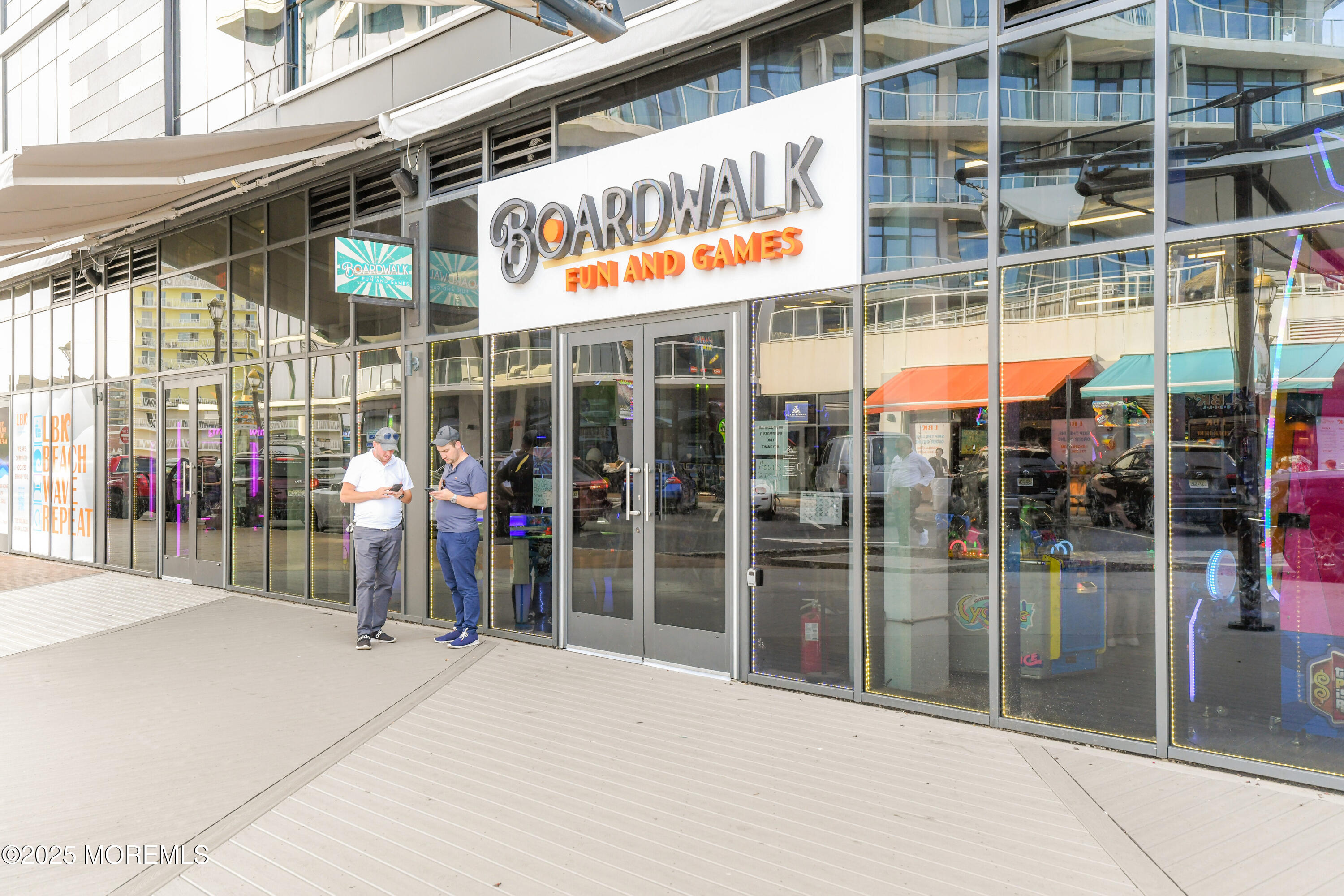 30 Melrose Terrace, Unit 303 Long Branch, NJ 07740 - Photo 50 of 54 a view of a building with a glass door