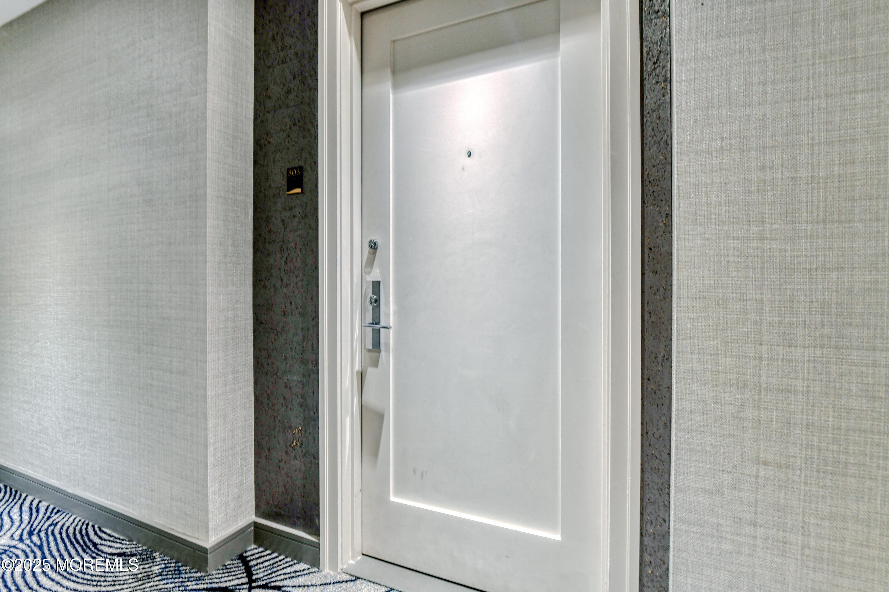 30 Melrose Terrace, Unit 303 Long Branch, NJ 07740 - Photo 7 of 54 a bathroom with a glass door
