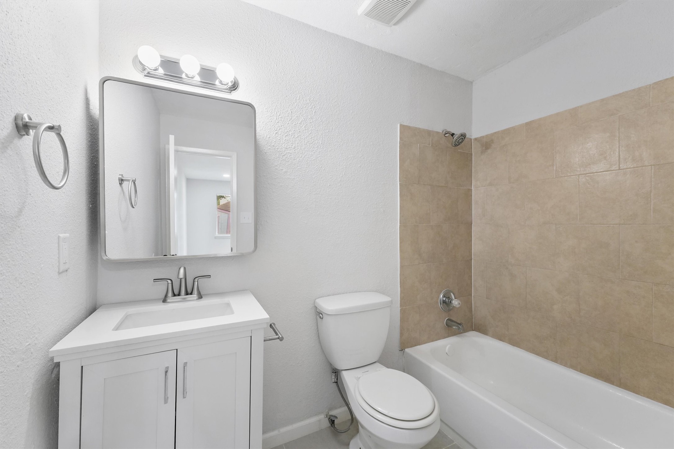 23311 Pebworth Place Spring, TX 77373 - Photo 12 of 24 a bathroom with a toilet sink shower and mirror