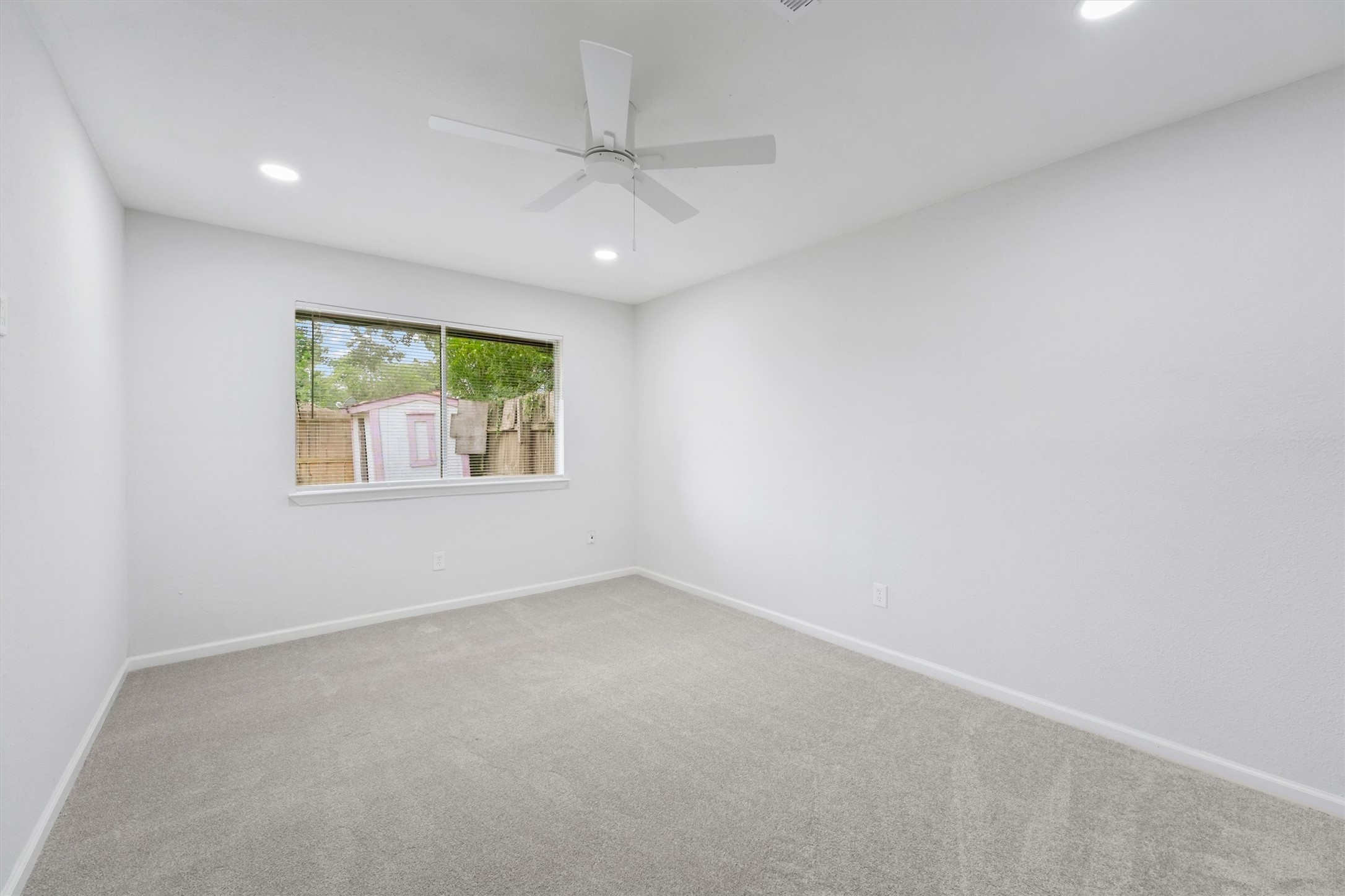23311 Pebworth Place Spring, TX 77373 - Photo 16 of 24 an empty room with windows