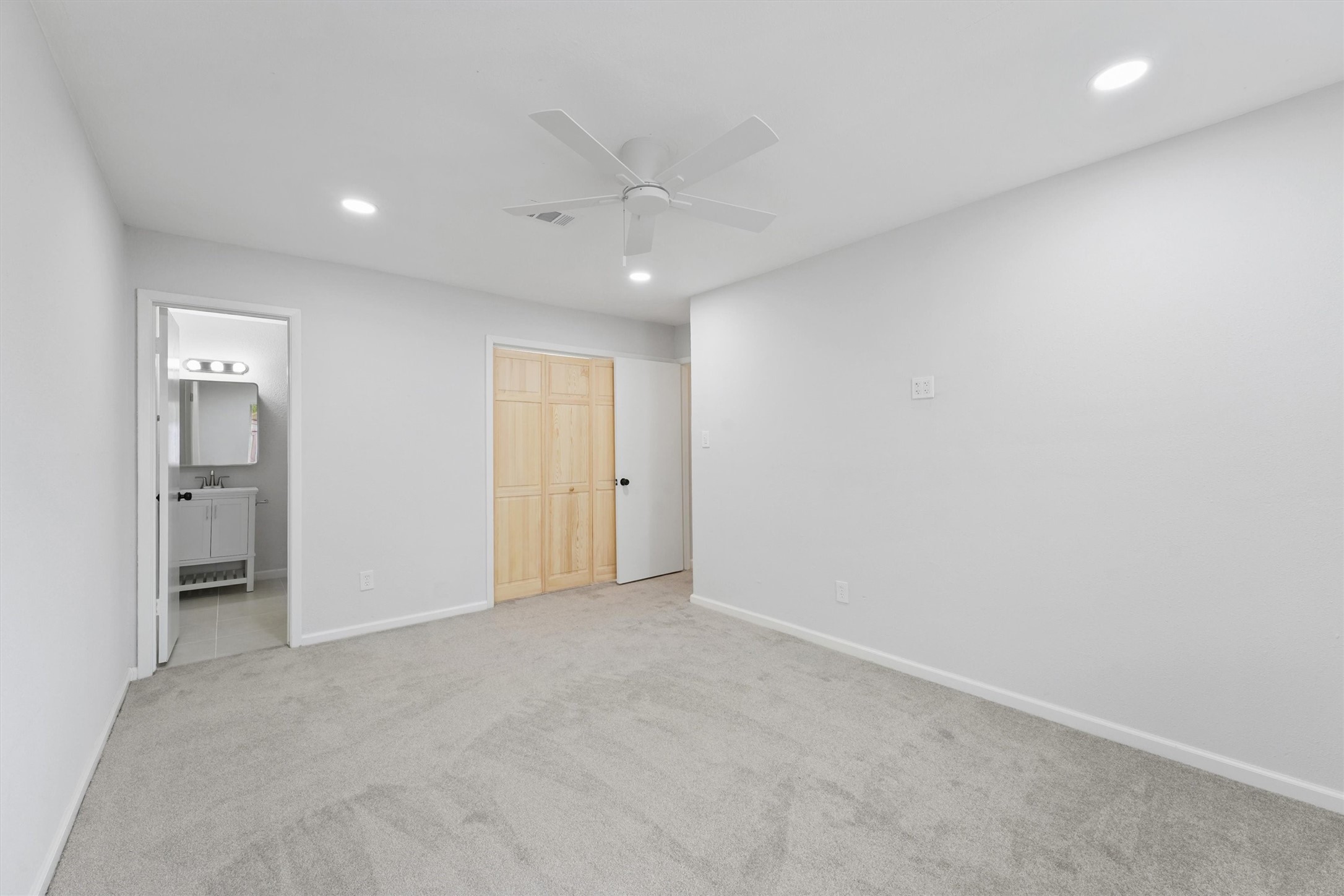 23311 Pebworth Place Spring, TX 77373 - Photo 17 of 24 an empty room with a bathroom