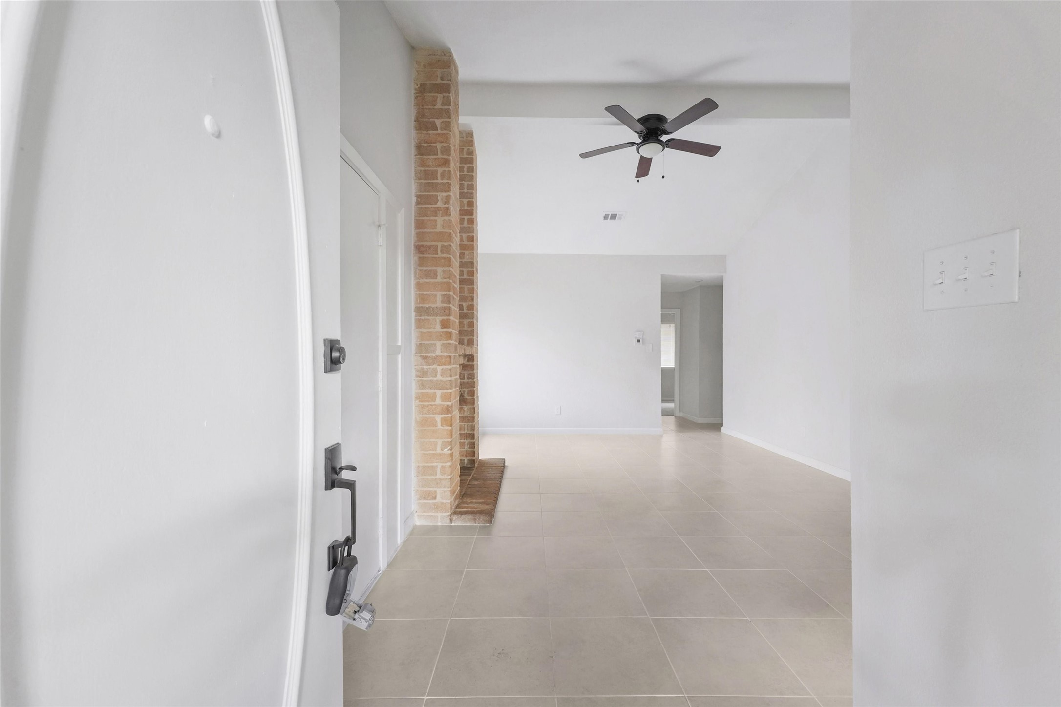 23311 Pebworth Place Spring, TX 77373 - Photo 19 of 24 a view of a hallway with a ceiling fan