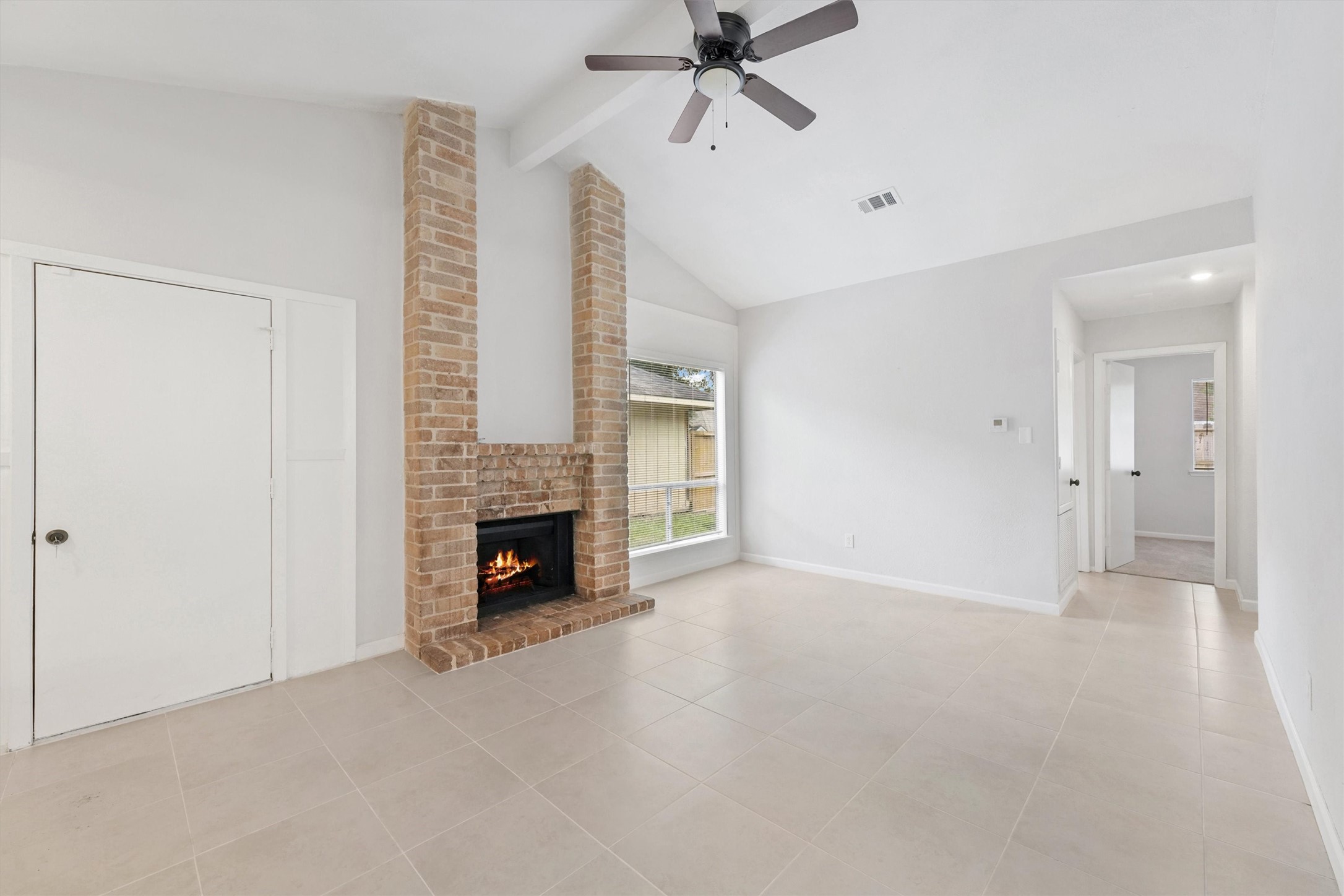 23311 Pebworth Place Spring, TX 77373 - Photo 2 of 24 a view of a livingroom with a fireplace and window