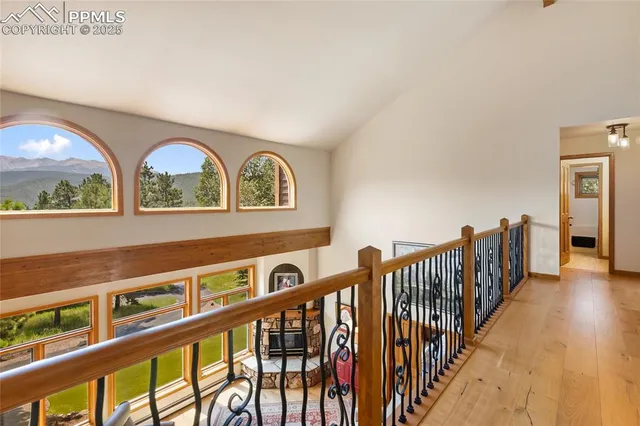 a view of an entryway with wooden floor