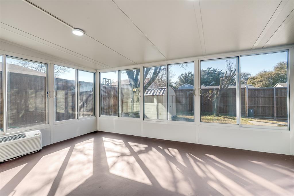 5602 Magnolia Lane Rowlett, TX 75089 - Photo 19 of 24 a view of empty room with wooden floor and fan