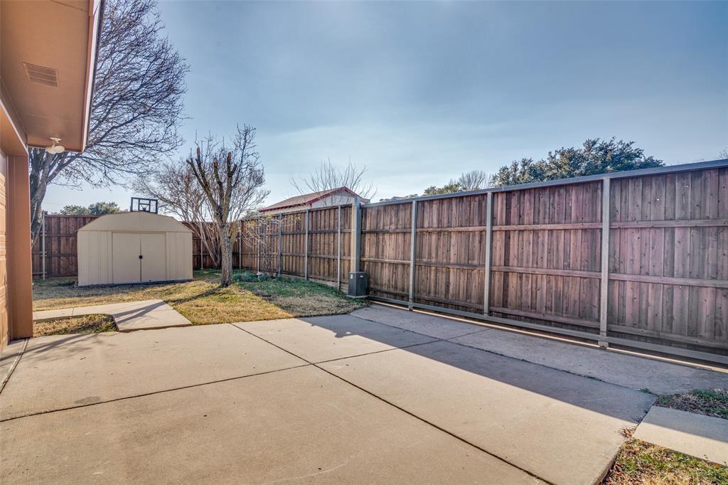 5602 Magnolia Lane Rowlett, TX 75089 - Photo 21 of 24 a view of a backyard