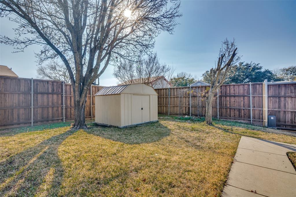 5602 Magnolia Lane Rowlett, TX 75089 - Photo 23 of 24 a view of backyard with wooden fence