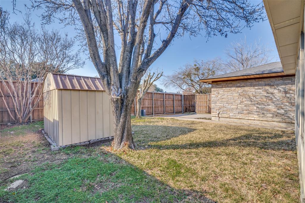 5602 Magnolia Lane Rowlett, TX 75089 - Photo 24 of 24 a view of a backyard of the house