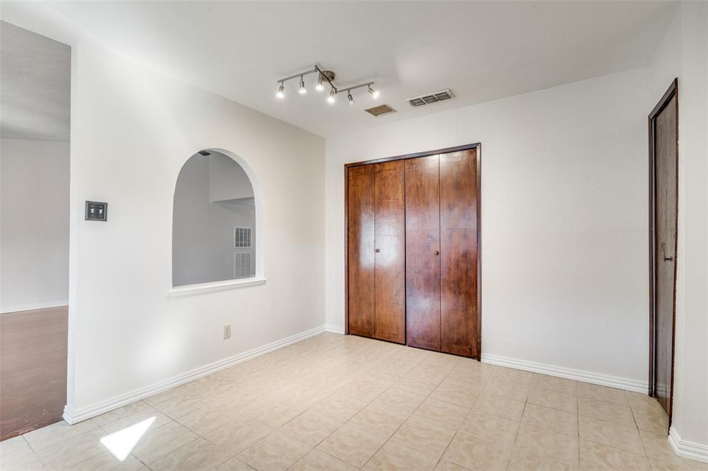 5602 Magnolia Lane Rowlett, TX 75089 - Photo 9 of 24 a view of an empty room with a mirror