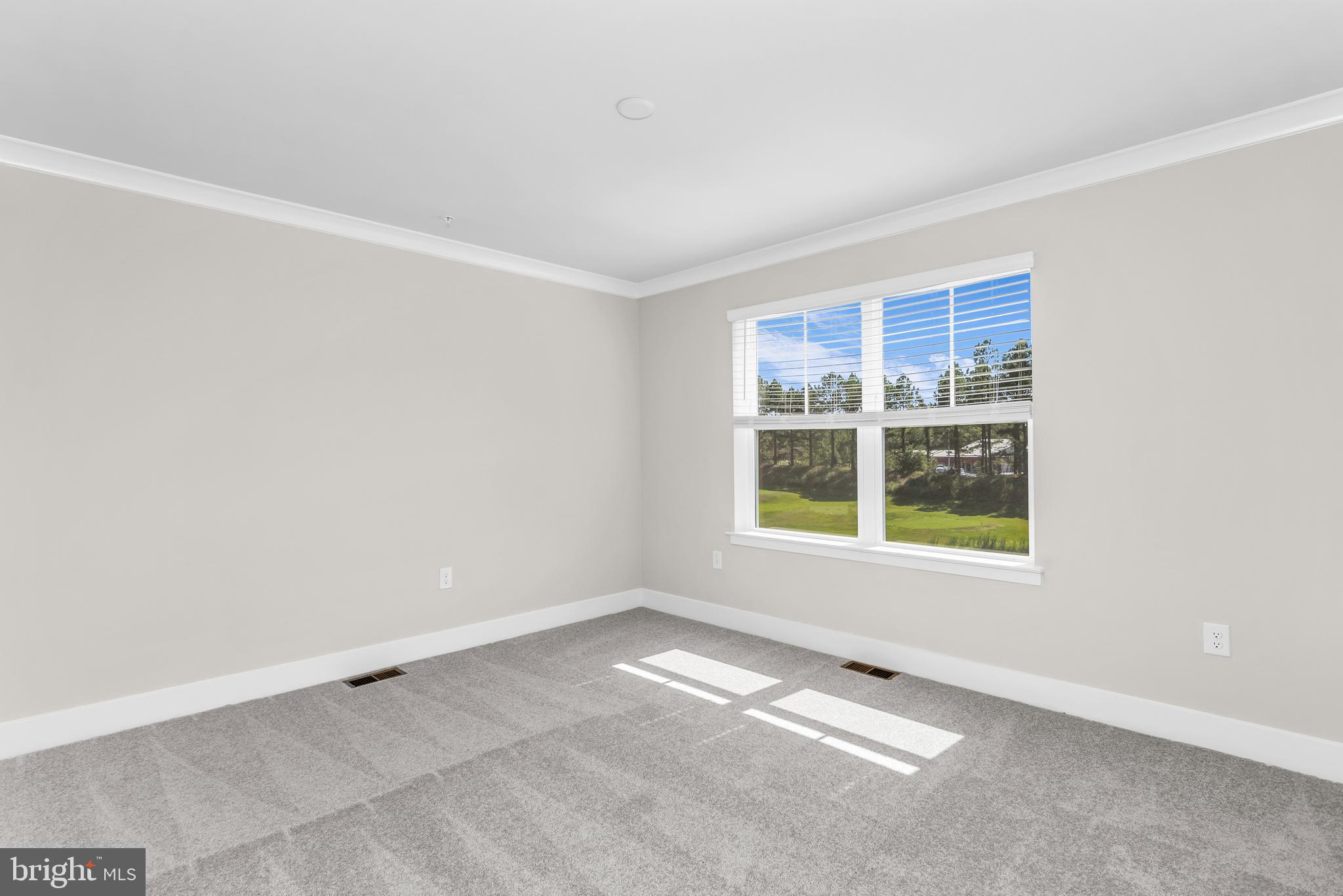 2110 Winterberry Lane Cambridge, MD 21613 - Photo 17 of 46 an empty room with a window