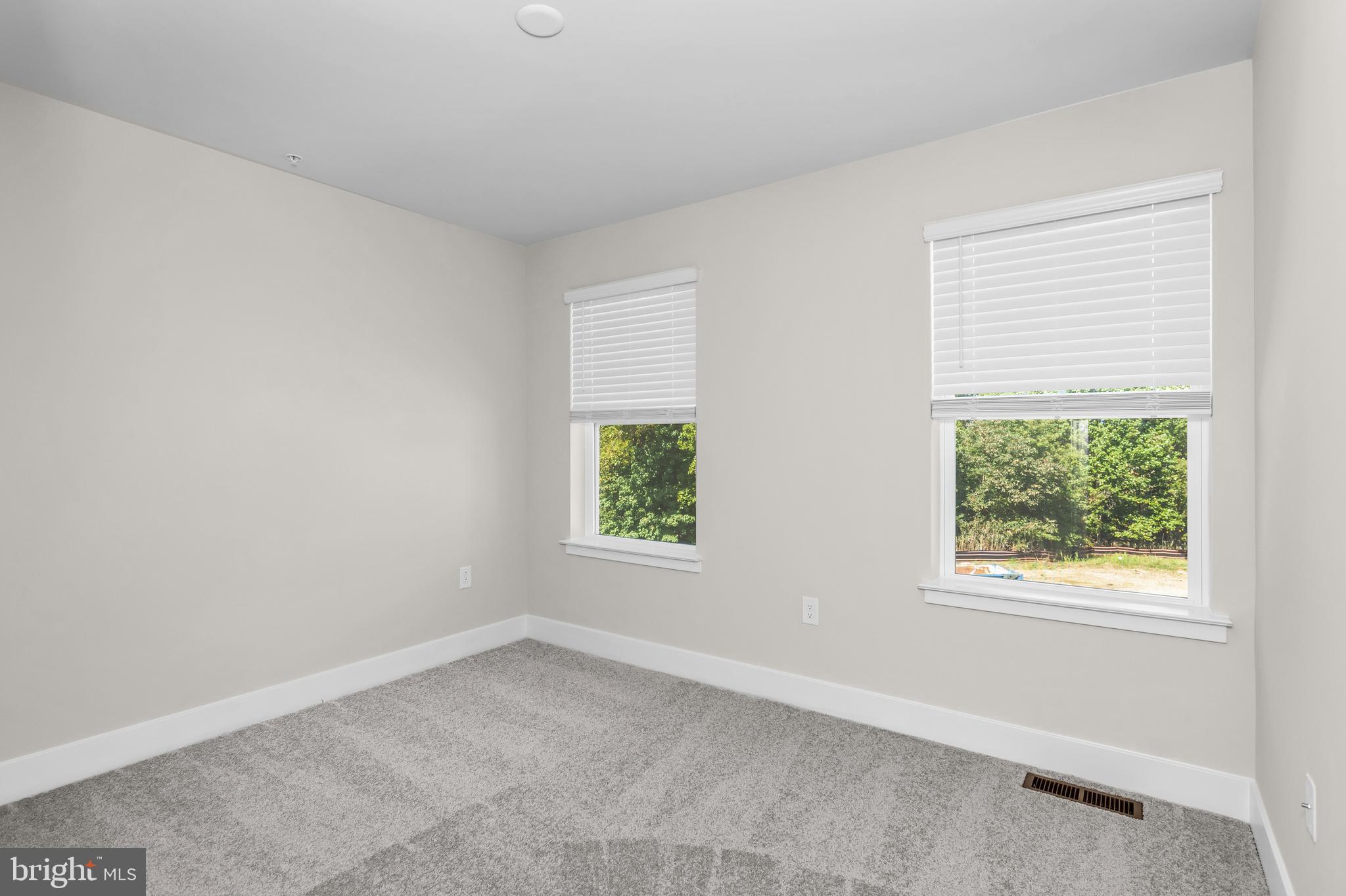 2110 Winterberry Lane Cambridge, MD 21613 - Photo 21 of 46 an empty room with windows