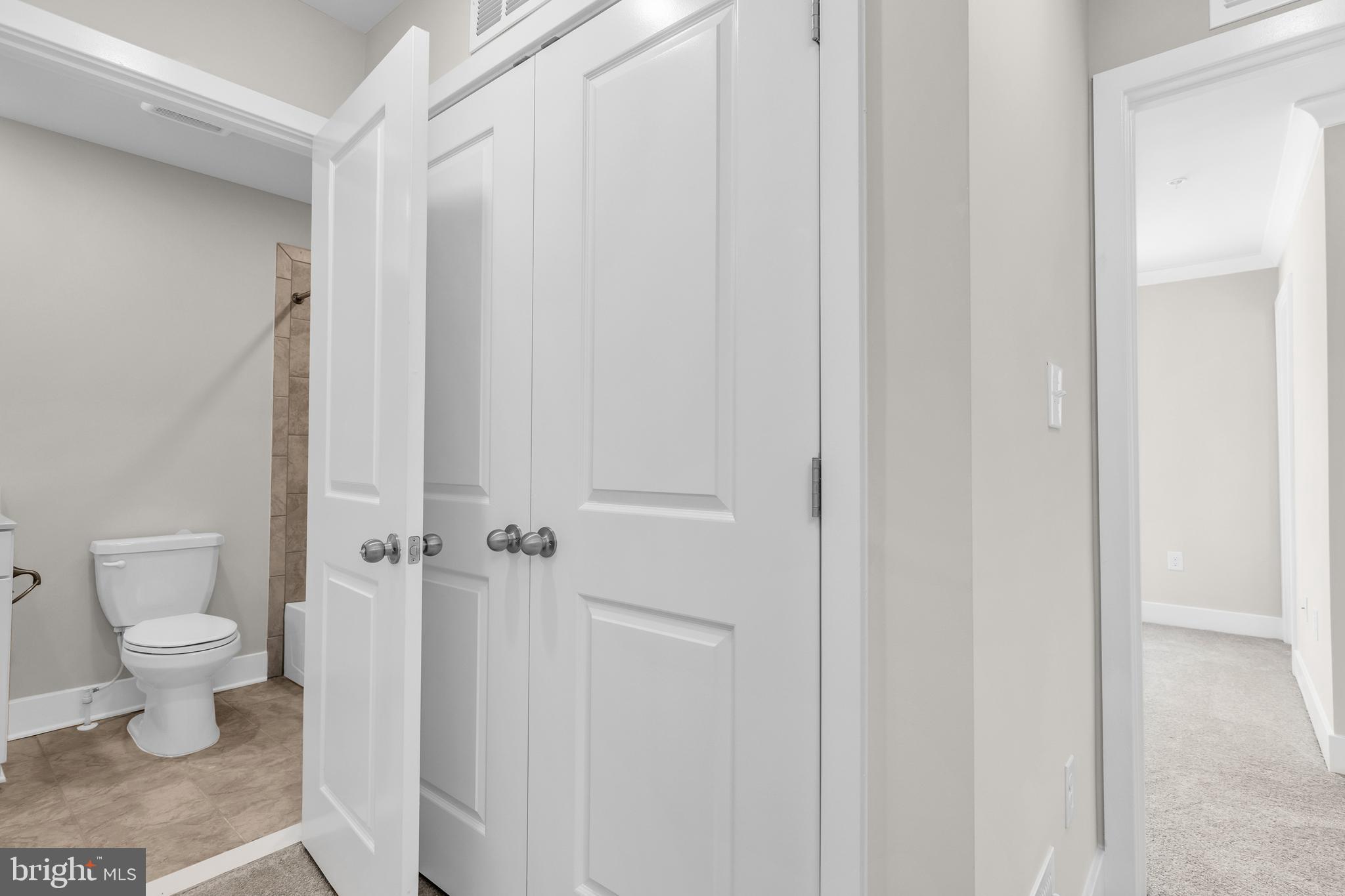 2110 Winterberry Lane Cambridge, MD 21613 - Photo 24 of 46 a bathroom with a toilet and a shower