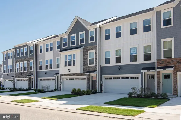 a view of a building with a yard