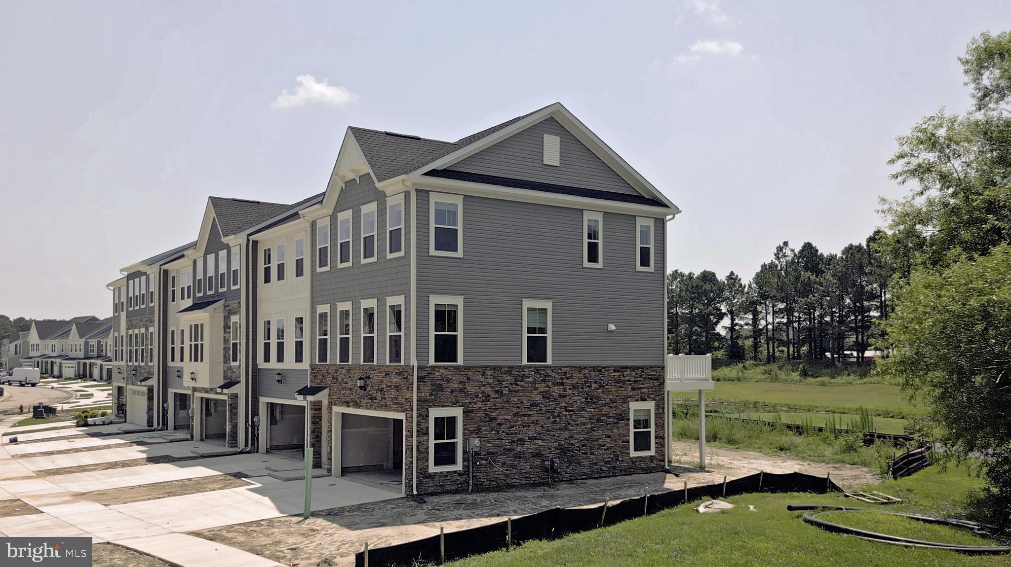 2110 Winterberry Lane Cambridge, MD 21613 - Photo 39 of 46 a front view of a house with garden