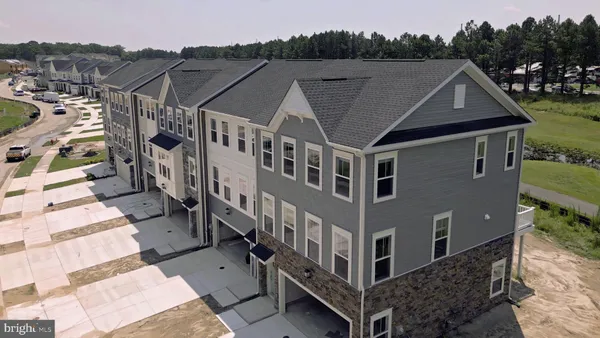 a view of a big house with many windows