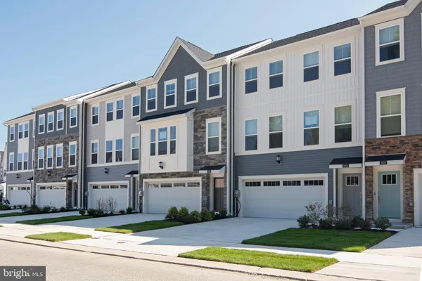 a view of a building with a yard