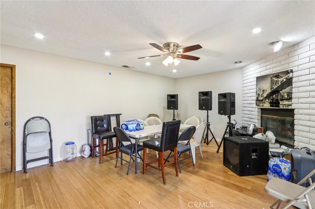 14057 Crow Road Apple Valley, CA 92307 - Photo 11 of 33 a view of a dining room with furniture and chandelier