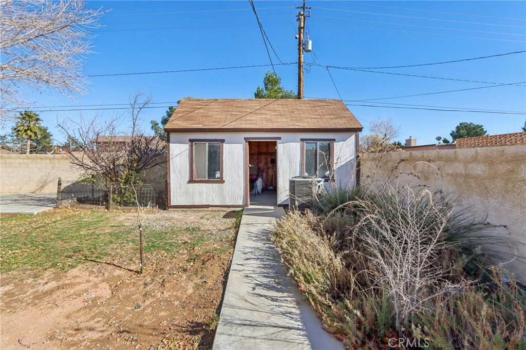 14057 Crow Road Apple Valley, CA 92307 - Photo 24 of 33 a house view with a outdoor space