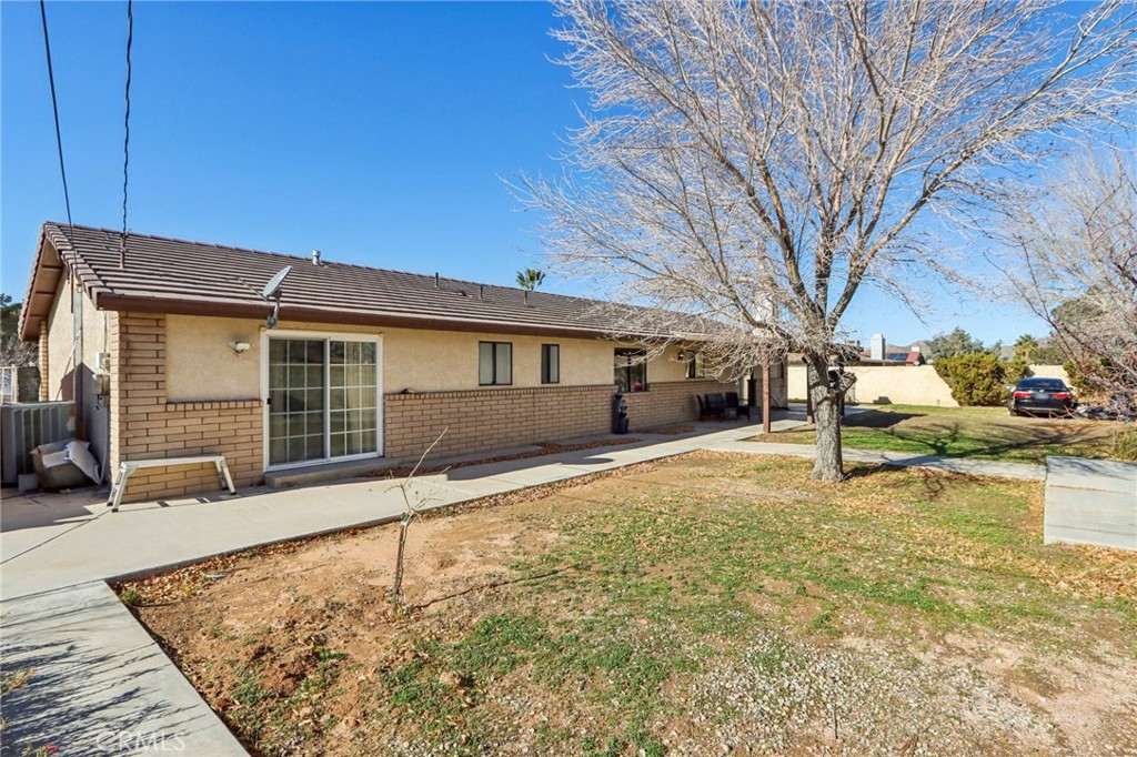 14057 Crow Road Apple Valley, CA 92307 - Photo 25 of 33 a view of a house with a patio