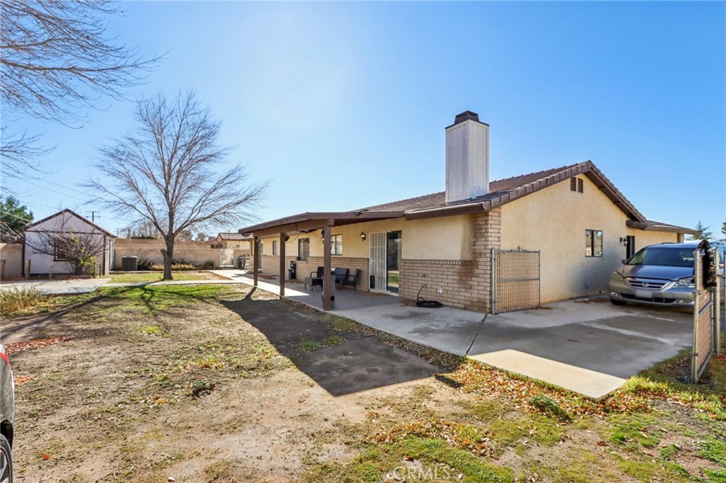 14057 Crow Road Apple Valley, CA 92307 - Photo 29 of 33 a view of a house with snow on the road