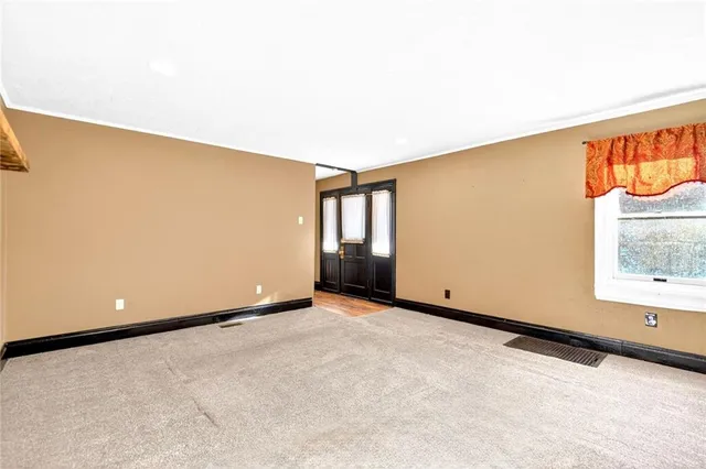 an empty room with windows