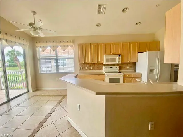 $449,000 | 3054 Driftwood Way, Unit 4508, Naples, FL 34109