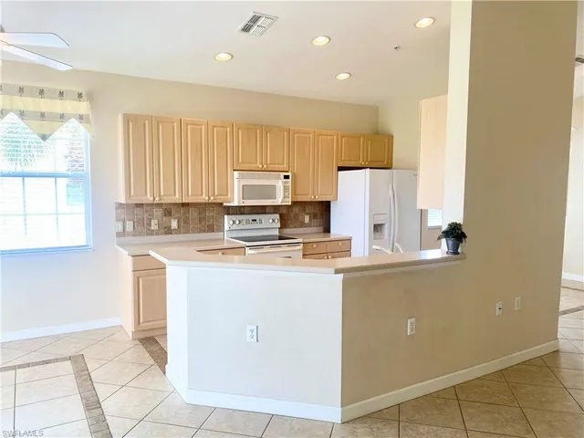 $449,000 | 3054 Driftwood Way, Unit 4508, Naples, FL 34109