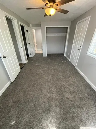 a view of empty room with windows