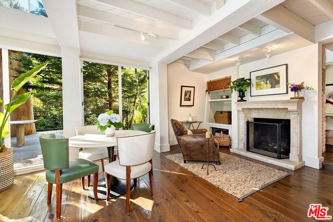 689 Brooktree Road Santa Monica, CA 90402 - Photo 14 of 32 a living room with furniture and a fireplace