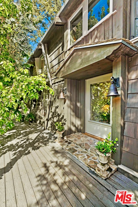 689 Brooktree Road Santa Monica, CA 90402 - Photo 31 of 32 a front view of a house with a yard